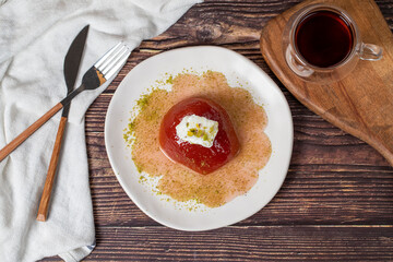 Quince dessert with sorbet on a gray background. Creamy quince dessert. Turkish Ramadan sweet...