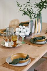 table set for serving food. in a calm natural style with wood and glass