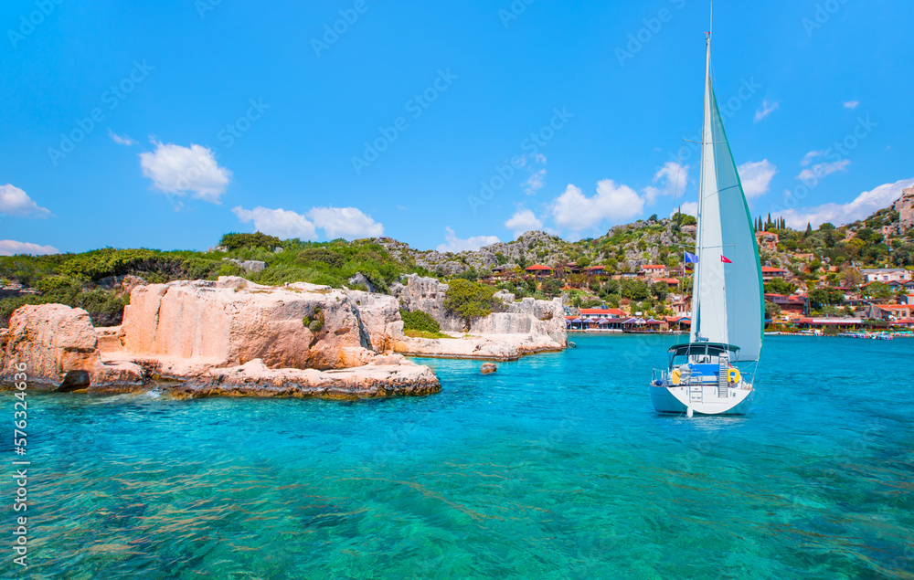 Wall mural Sailing Yacht from sail regatta on mediterranean sea - Sailing luxury yacht with white sails in the Sea - Kekova island (ucagiz -Kale), Antalya Turkey