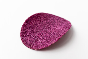 Obraz na płótnie Canvas Purple sweet potato chips on a white background