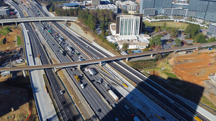 Skytrain railway, elevated bypass, busy traffic on Highway I-285 (the Perimeter), large construction site in midtown Atlanta, Georgia, USA