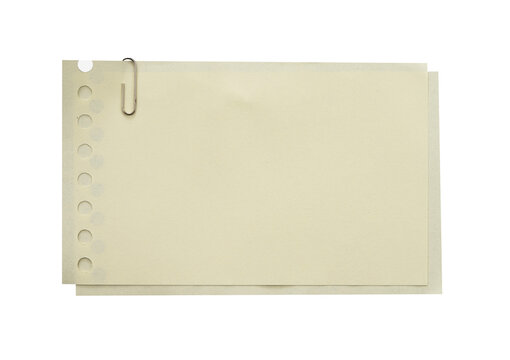 stack of blank note paper with clip
