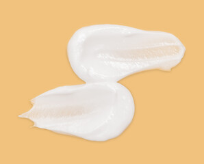 Face creme body moisturizer, hair conditioner smear smudge stroke on color background. White cosmetic cream texture skincare lotion swatch. Creamy beauty product close up. Shampoo, balm. Ointment