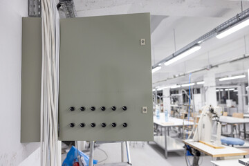 The door of an electrical panel with apparent switches