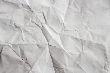 Crumpled white paper texture background. Wrinkled paper surface for designs.