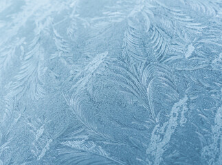 Abstract frosty pattern on a window. Can be used as a winter holiday background. Ice, Frozen, Frost, Frosted Glass, Textured