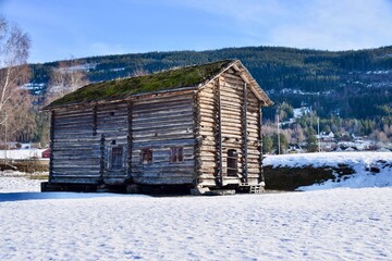 Bygland, Norway, February 21, 2023. Historical Wooden Log Farm Buildings. 
