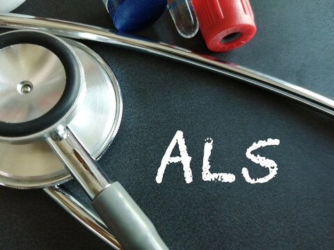 ALS or Amyotrophic lateral sclerosis a type of motor neuron disease, medical conceptual image, black background.
