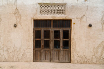Dubai, UAE. Buildings and houses of traditional historical architecture of the old city of the Emirates in the Persian Gulf. The clay houses of Al Sifa.