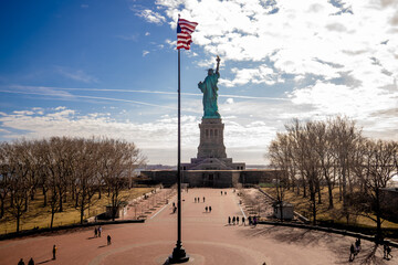 Statue of Liberty on a synny day with blue sky