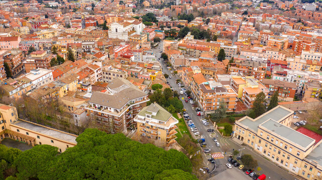 Aerial view of Genzano di Roma, a small town located in the Metropolitan City of Rome, Italy. The town is part of the Castelli Romani area.