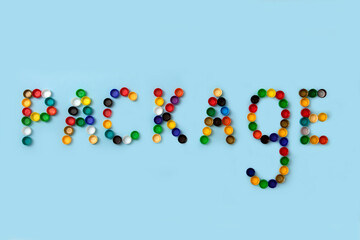 word package is lined with used plastic caps on a blue background