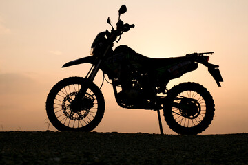 silhouette of a bike. silhouette of a motorcycle. motorcycle on sunset. 
Silhouette Motocross...