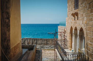 the famous ancient Phoenician wall, which was built to protect Batroun from tidal waves, Lebanon
