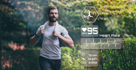 Man running in the park. Healthy runner with smart fit watch. Technology, training, health concept. - obrazy, fototapety, plakaty