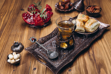 Ramadan table top view. Banner with traditional Arabic dishes, cup of tea and food sets