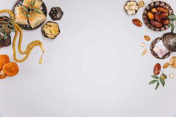 Traditional table for Ramadan. Set of dried fruits, on old islamic tableware, top view, copy space.