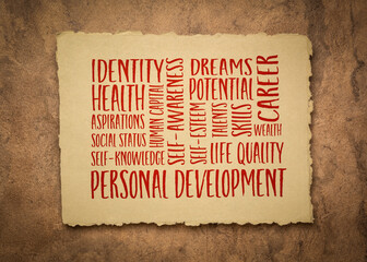 personal development word cloud on an art paper, self improvement concept