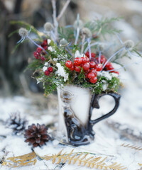 Christmas decorations, winter bouquet of rowan and twigs in the snow, composition, Christmas card