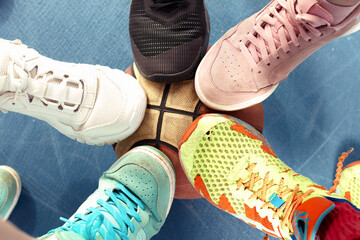 sneakers standing in the circle, view from above. Colorful sneakers standing in circle. - Powered by Adobe