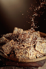 Crackers with sunflower seeds and flax seeds.