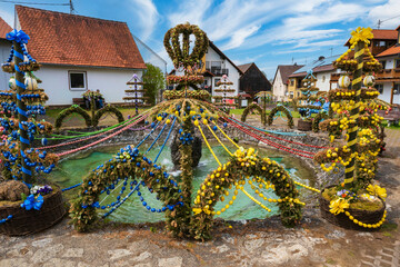 View of the traditionally decorated Easter fountain in Bieberbach/Germany in Upper Franconia