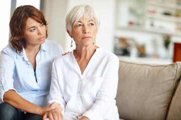 Obraz premium Whats on your mind, Mom. Shot of a woman supporting her elderly mother through a difficult time.