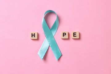Teal awareness ribbon arrange hope word for Ovarian Cancer month, cervical cancer, Polycystic Ovary...
