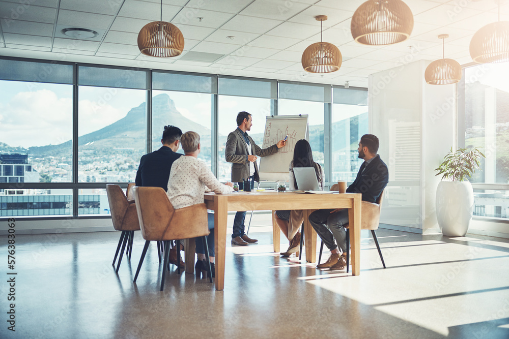 Canvas Prints Creating a powerful action plan together. Shot of a businessman giving a presentation to his colleagues in an office.