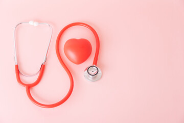 Fototapeta premium Red heart with doctor physician's stethoscope, World heart health day, doctor day.