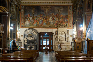 Fototapeta na wymiar Entrance door of baroque church of San Marcello al Corso in Rome, Italy 