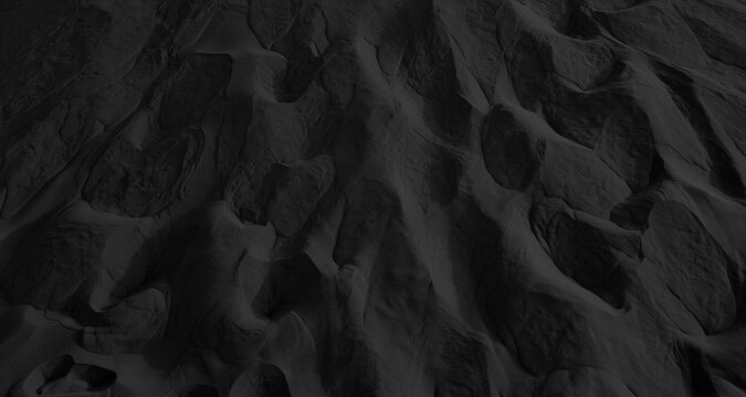abstract black sand beach used as background with blank space for design. full frame shot. close up sand dune texture for design. macro photography. background, texture, soft oceanic sand.