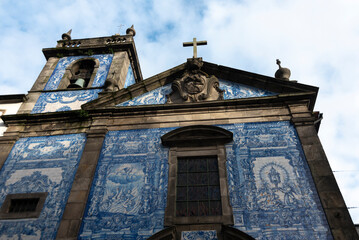 Facade of Capela das Almas in Porto, Portugal seen from below.