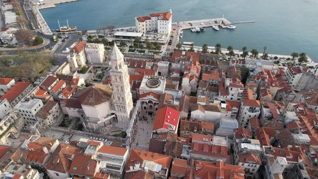Aerial view of old town Split in Croatia by drone showcasing the fortress, the Diocletian's palace, Saint Domnius cathedral and the bell tower