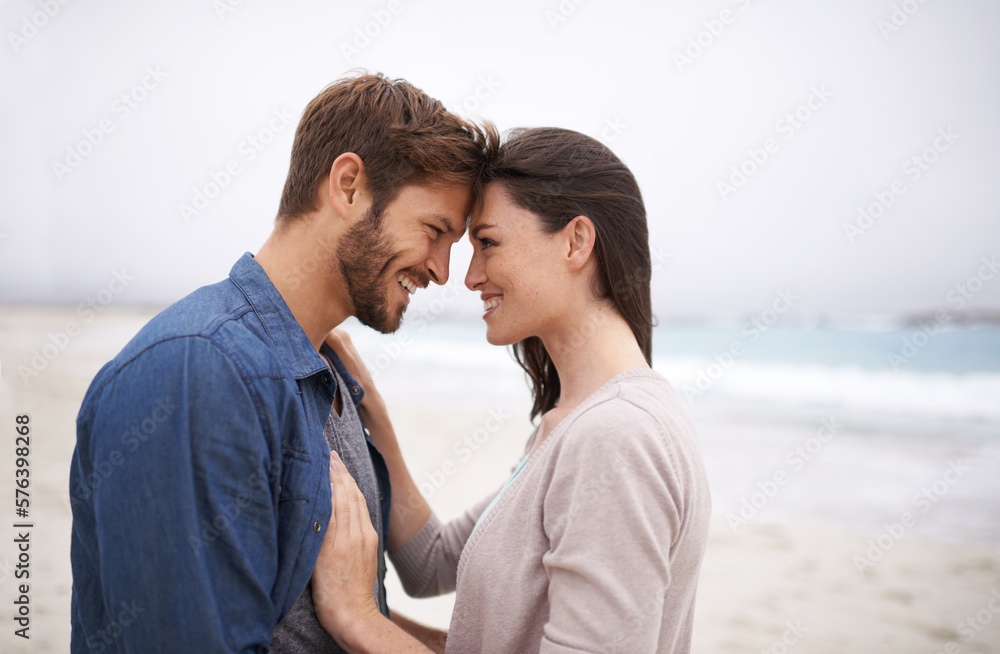 Canvas Prints Nature brings out that natural kind of love. Cropped shot of a romantic young couple at the beach.