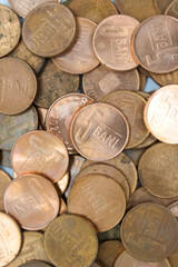 Closeup of 5 bani coins romanian currency with selective focus on foreground