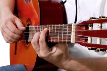 Man playing an acoustic guitar