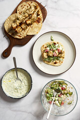 Greek chicken souvlaki pita with fresh vegetables with tzatziki sauce