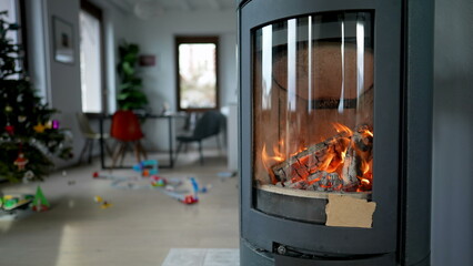 Home fire place burning in house interior during winter season. Cozy concept during Christmas season