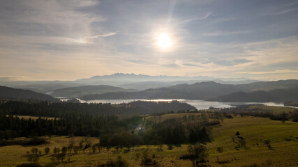 February evening. View from Czorsztyn to the Tatra Mountains against the background of the setting sun