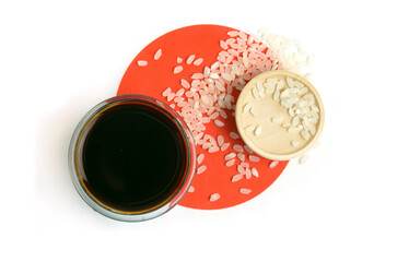japanese rice and soy sauce on japanese flag background