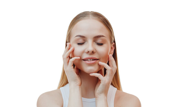 Skincare and spa. Smiling woman touches her clear, perfect facial skin after moisturizer, cosmetic cream, standing over white background