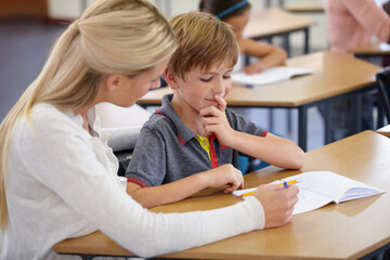 Enriching eager young minds. A young teacher in her classroom.