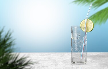 Cold water with ice in glass, summer drink.