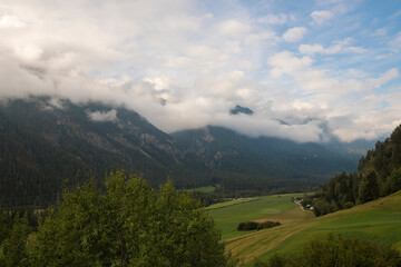 Fototapeta na wymiar View on a mountain valley in south-east Switzerland