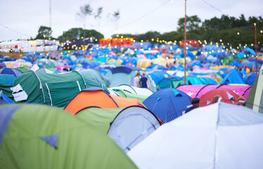 Tent city. Shot of a campsite filled with many colorful tents at an outdoor festival.