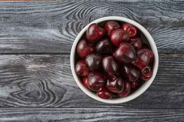Cherries in a plate on the table, ripe berries