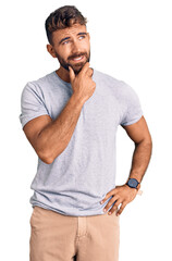 Young hispanic man wearing casual clothes thinking worried about a question, concerned and nervous...