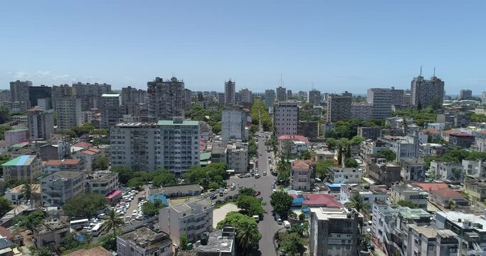 Aerial drone view of Maputo City, Mozambique, highlighting its modern urban landscape, on a bright sunny day.