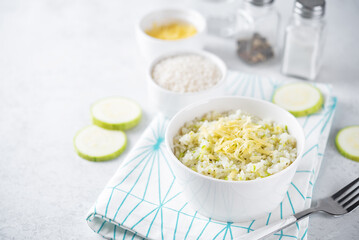 Zucchini cheese rice in a bowl